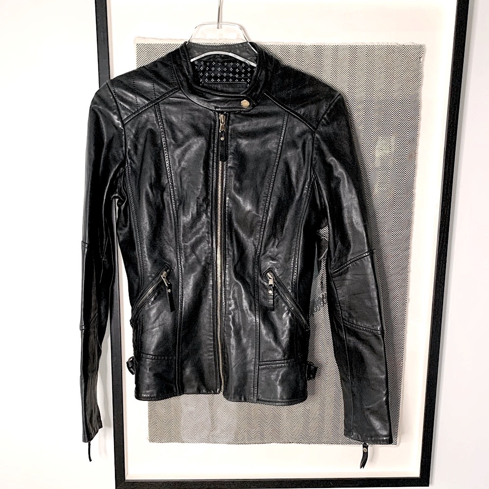 Danier leather slim moto jacket with gold zippers, light weight no bulk size XS